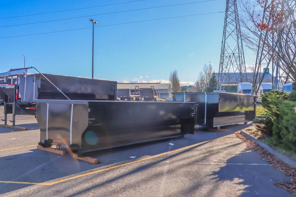 Roll-off dumpster ready for waste disposal at job site for 15 Yard Dumpster Rental in Pine Castle